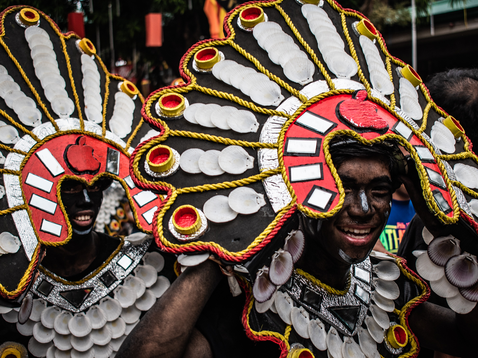 Dancers in coconut husk skirts and tribal costumes