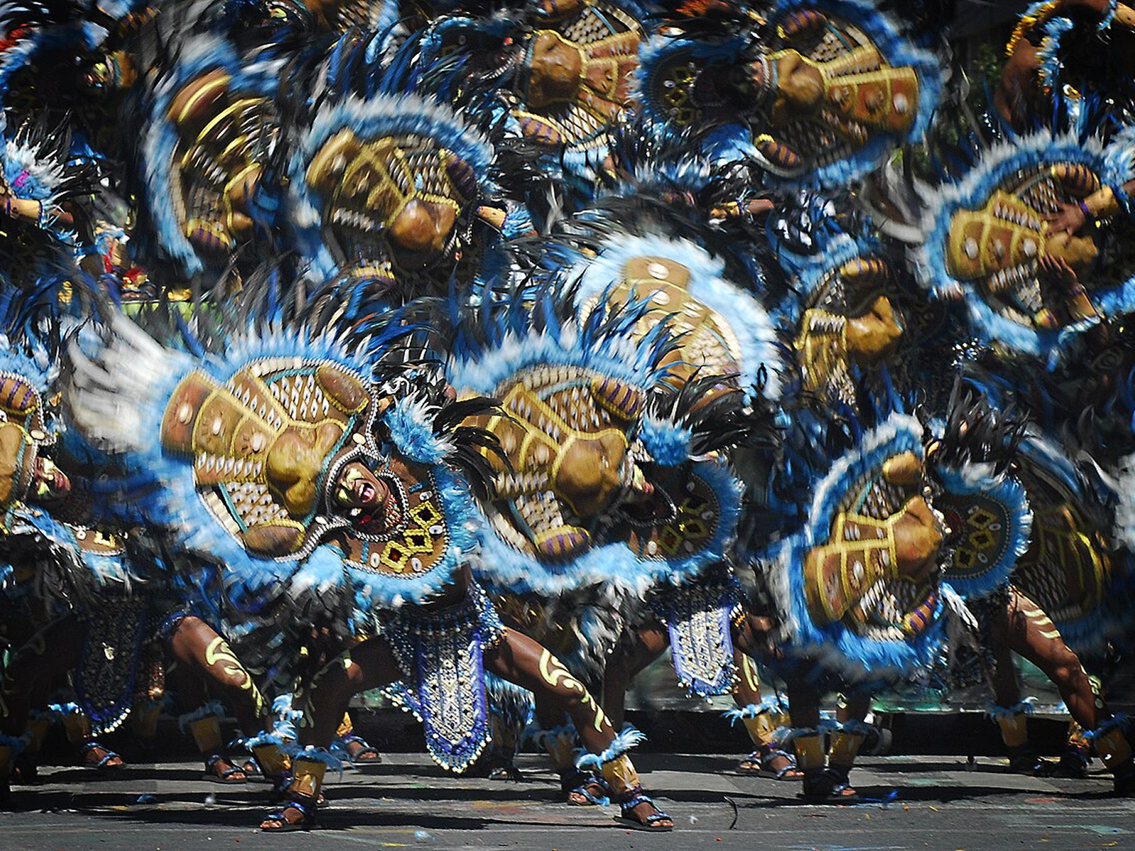 Forty dancers hitting the same beat in unison