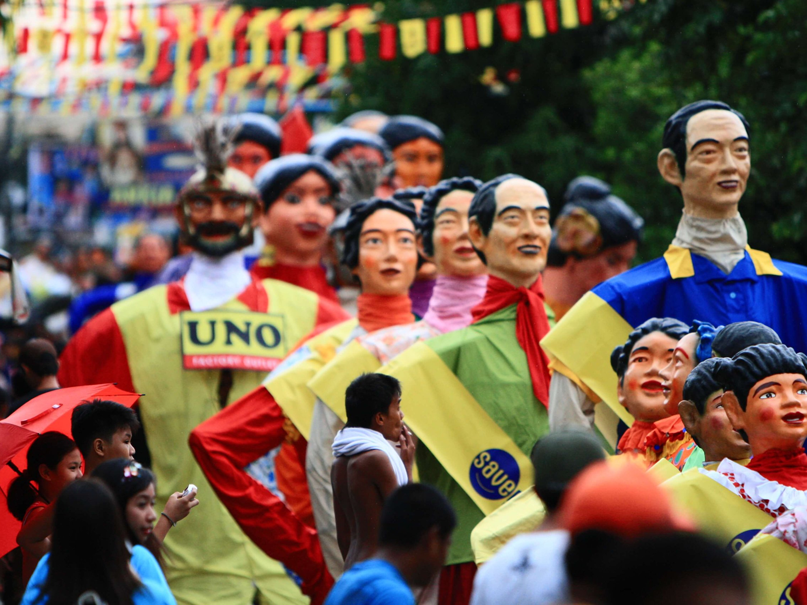 Twelve foot paper mache giants in Angono