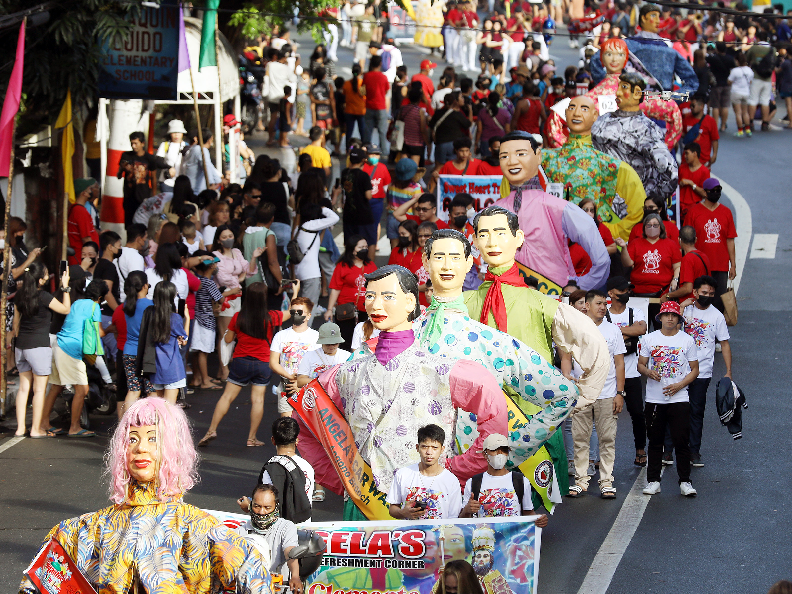 Holy water flung onto the parade during basaan