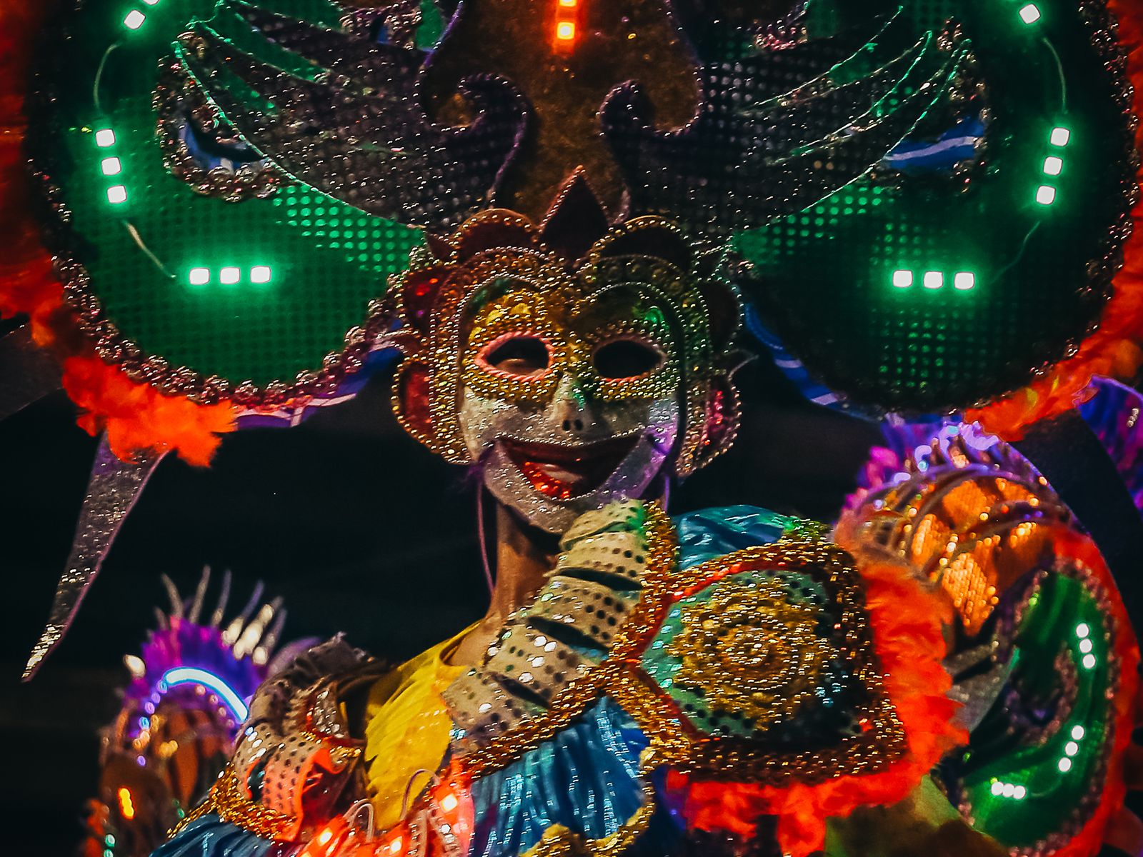 String lights and crowds during the MassKara celebration