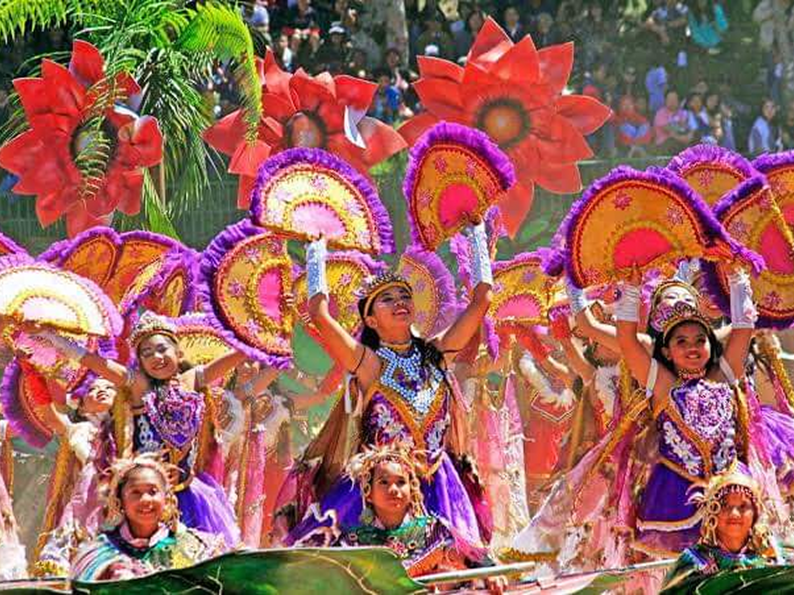 Street dancers in flower headdresses